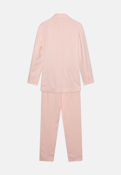 Pink suit set featuring a tailored blazer with a notched collar and long sleeves, paired with fitted trousers, both in a smooth fabric.