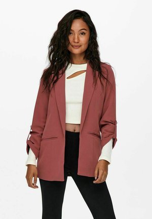 Raspberry pink blazer with notch lapels and rolled sleeves, featuring front pockets and a smooth, lightweight fabric.