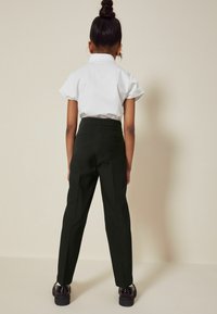 Next SENIOR TAPERED GOLD SNAP SCHOOL TROUSERS - Tygbyxor - long black