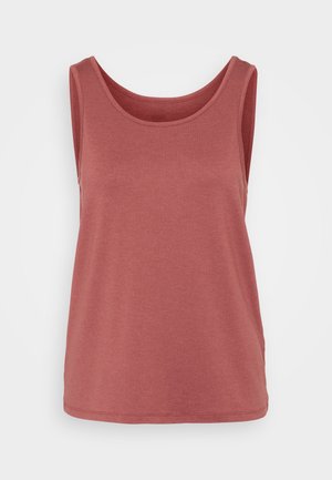 Vaaleanpunainen tanktoppi, joka on valmistettu pehmeästä puuvillasta. Siinä on pyöreä kaula-aukko, olkaimeton muotoilu ja hieman väljä istuvuus, jossa on huoliteltu helma.