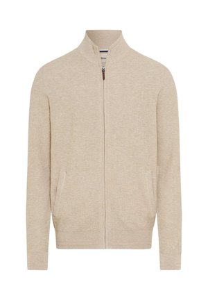 Beige cardigan med lynlås, høj krave, to forlommer, tekstureret stof og ribstrikkede manchetter og kant. Har en kontrasterende lynlåsdetaile.