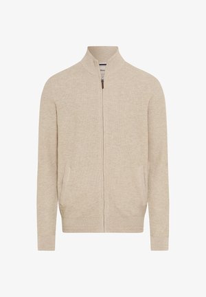 Beige Strickjacke mit Reißverschluss, hohem Kragen, zwei Fronttaschen, strukturierter Stoff und gerippten Bündchen sowie Saum. Mit kontrastierendem Reißverschlussdetail.