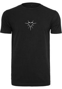 Svart bomulls T-skjorte med et sølv hjerte-design omgitt av pigger på brystet. Korte ermer og klassisk rund hals.