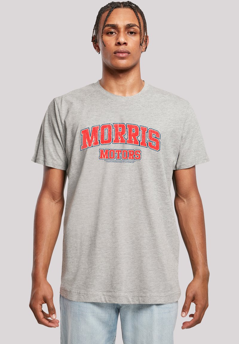 Gray cotton t-shirt with a round neckline, featuring bold red text that reads "MORRIS MOTORS." Short sleeves with a relaxed fit.