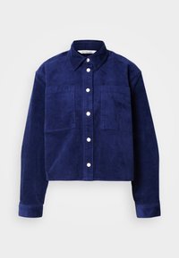 Giacca camicia in velluto a coste navy con due tasche frontali, chiusura frontale con bottoni, colletto e maniche lunghe con polsini a bottoni.