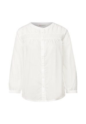 Witte katoenen blouse met lange mouwen, ronde hals, knoopsluiting, gestructureerde yokedetail en geplooide accenten bij de schouders.