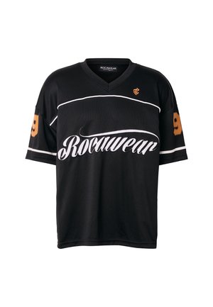 Fekete Rocawear rövid ujjú ing fehér logófelirattal a mellkason, fehér csíkkal és narancssárga 9-es számmal az ujjakon.