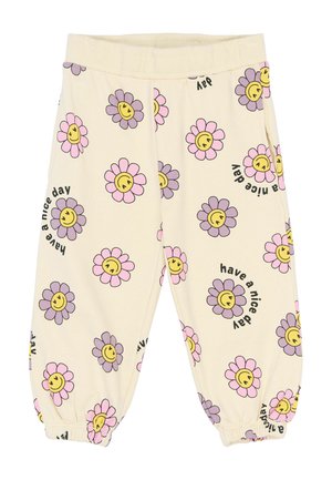 Cream-colored children's pants with pink and purple smiling flower patterns and "have a nice day" text printed repeatedly. Elastic cuffs and waistband.