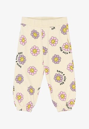 Kreemi värvi laste püksid, millel on roosa ja lilla naeratava lille mustrid ning korduvalt trükitud tekst "soovime head päeva". Elastsed soonikud ja vöökoht.