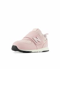 Light pink athletic shoe with a textured synthetic upper, Velcro strap, and a white midsole. Rubber outsole features black accents.