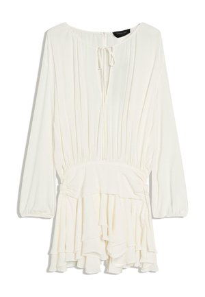 Hvid minikjole med lange ærmer, oplagt talje, nøglehulshalsudskæring med bindebånd og lagdelt flæsekant.