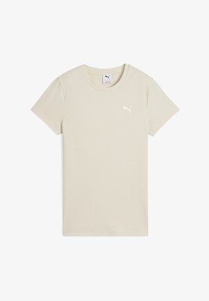 T-shirt beige à manches courtes en tissu côtelé. Doté d'un col rond et d'un petit logo Puma blanc sur la poitrine gauche.