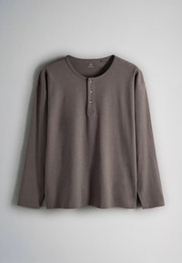 Long-sleeve brown henley shirt with three buttons at the collar, laid flat against a light gray background.