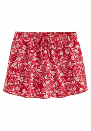 Red floral patterned skort made of lightweight fabric. Features an elastic waistband with a drawstring. Smooth texture, above-knee length.