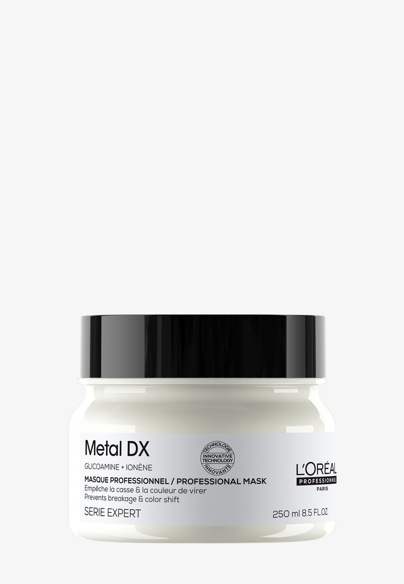 Słoik maski do włosów L'Oréal Professionnel Metal DX z czarną pokrywką, oznakowany, aby zapobiegać łamliwości i zmianom koloru, pojemność 250 ml.