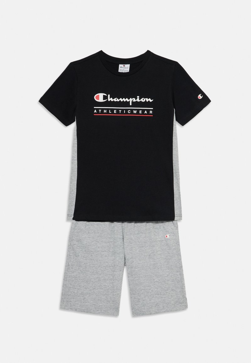 Black short-sleeve T-shirt with white and red "Champion ATHLETICWEAR" logo, paired with gray shorts featuring a small logo on the hem.