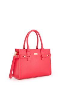Red textured leather handbag with double handles, detachable strap, gold-tone accents, and minimalist design. Features buckle detailing.