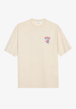 Crème-kleurig katoenen T-shirt met een losse pasvorm, voorzien van een kleine geborduurde afbeelding van een karakter en het woord "BRAIN" in rood en blauw.
