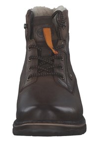 Brown leather lace-up boot with black and orange accents, a fleece-lined interior, and a rugged sole, featuring metal eyelets and a reinforced toe.