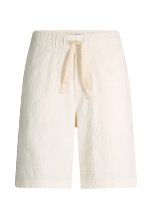 Shorts en maille couleur crème avec une taille élastique et un cordon de serrage, avec un motif à carreaux texturé subtil.