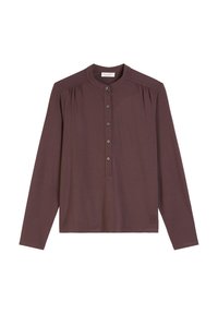 Haut à manches longues en mauve profond, avec un col henley à boutons et des détails froncés aux épaules. Tissu doux avec un minimum de marquage.