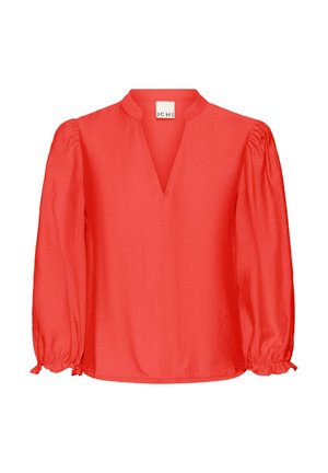 Rød bluse med V-hals, pufærmer og rynkede manchetter. Lavet af letvægtsstof, der har en glat tekstur og et enkelt design.