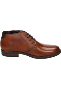 Bottines en cuir marron avec une finition lisse, bout rond, devant lacé et talon bas. Présente une doublure intérieure texturée.