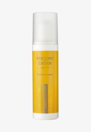 Bouteille de lotion cylindrique jaune avec une pompe à poussoir blanche et des accents dorés. L'étiquette indique "Margaret Dabbs London Fabulous Hands Hand Lotion."