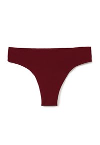 Un string pour femme de couleur rouge foncé, posé à plat sur un fond blanc.