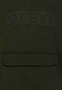 Guess Jersey con capucha - olive