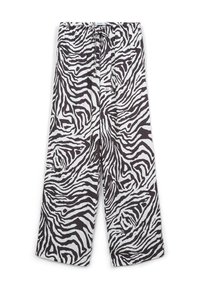 Pantaloni a gamba larga in motivo zebra bianco e nero, realizzati in tessuto leggero. Vita elastica con cordoncino. Texture liscia.