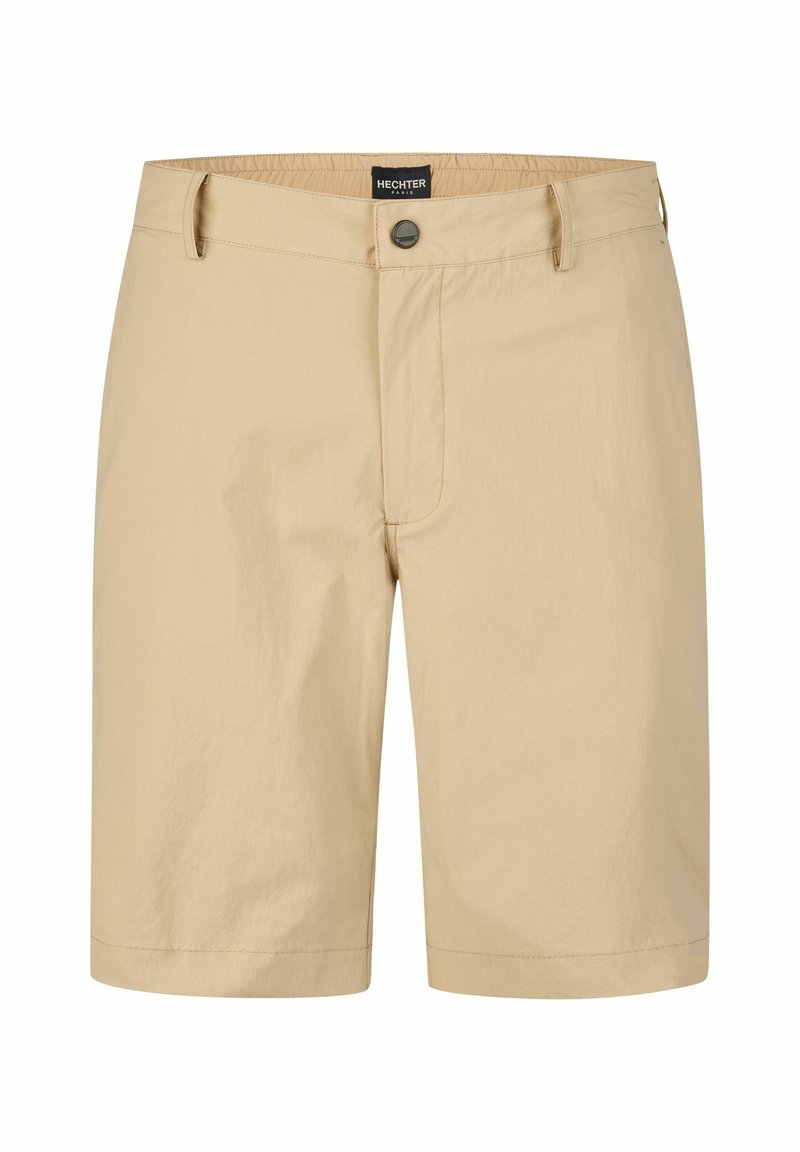 Shorts beiges en tissu léger. Dotés d'une fermeture à bouton, de deux poches avant et d'un ourlet droit. Design minimaliste.