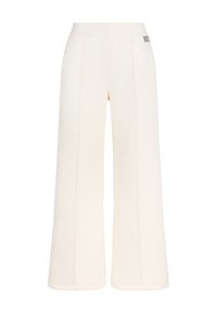 Brede sweatpants van zacht crème stof, met een elastische tailleband en zichtbare stikdetails. Subtiel logo aan de zijkant.