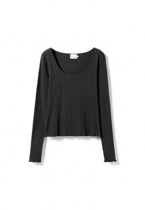 Melnas garām piedurknēm augšdaļa ar ribētu tekstūru, apaļu kakla izgriezumu un saīsinātu garumu. Apakša ir ar neapstrādātu, frizētu malu, kas piešķir detaļu.