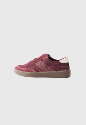 Burgundy sneakers with textured upper, contrasting accents, round toe, and rubber sole. Features logo on the side and white stitching details.