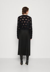 ONLY ONLNEWMELISA - Jupe plissée - black
