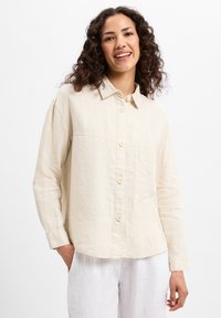 Unselected, beige