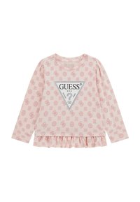 Camicia a maniche lunghe di un rosa chiaro con un motivo floreale su tutto il tessuto, un dettaglio logo triangolare al centro e un orlo a volant.