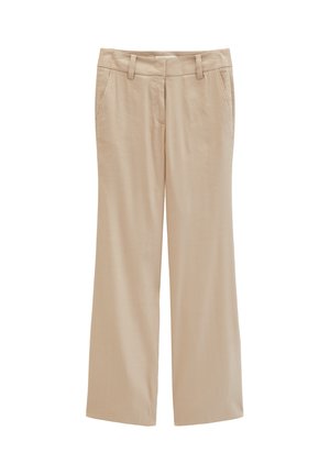 Pantalon large beige avec passants de ceinture, poches latérales et fermeture éclair à l'avant.