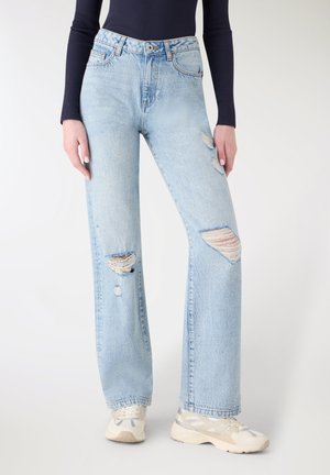 CON STRAPPI - Jeans a sigaretta - blu denim chiaro