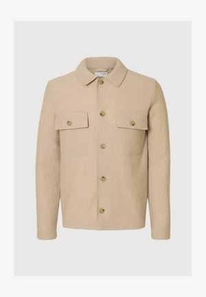 Beige wool blend jacket with a collared neckline, two chest pockets, and beige button closures. Features a textured fabric finish.