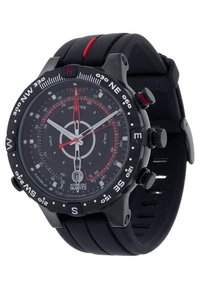 Black Timex quartz wristwatch with compass bezel, multiple red and white hands, tide and temperature indicators, and black silicone strap.