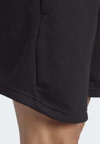 adidas Performance YOGA BASE - Sports shorts - black/carbon