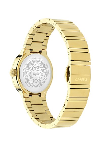 Kuldne roostevabast terasest käekell poleeritud lülidega käevõruga, ümmarguse sihverplaadi, safiirkristalli ja Medusa logoga korpuse tagaküljel.