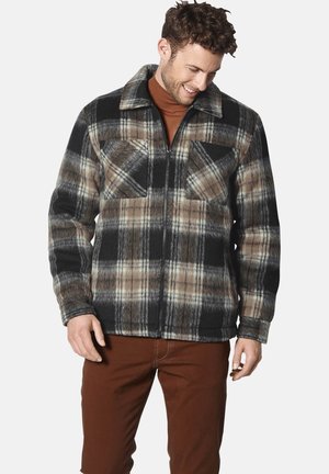 Karierte Flanelljacke in Schattierungen von Schwarz, Braun und Beige, mit einem Reißverschluss an der Vorderseite, zwei Brusttaschen und einem Kragen. Weicher Stoff.