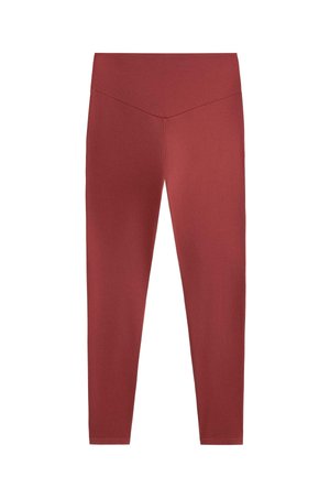Rode rekbare legging met een hoge tailleband, voorzien van een gladde textuur en een aansluitend ontwerp, taps toelopend naar een nette enkelafwerking.