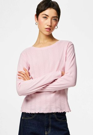 - Bluzka z długim rękawem