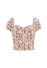 Blommig crop top med puffärmar, tillverkad av lättviktigt tyg, med en rosett framtill och en vit bakgrund med rosa och gula blommor.