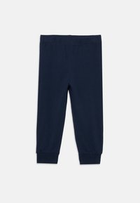 Leggings blu navy in misto cotone con vita elastica. Design aderente con polsini a coste alla caviglia e senza cuciture o fantasie visibili.