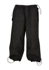 Pantaloni in denim scuro dalla vestibilità ampia, con vita elastica, coulisse regolabili e due grandi tasche laterali. Polsini arricciati alle caviglie.